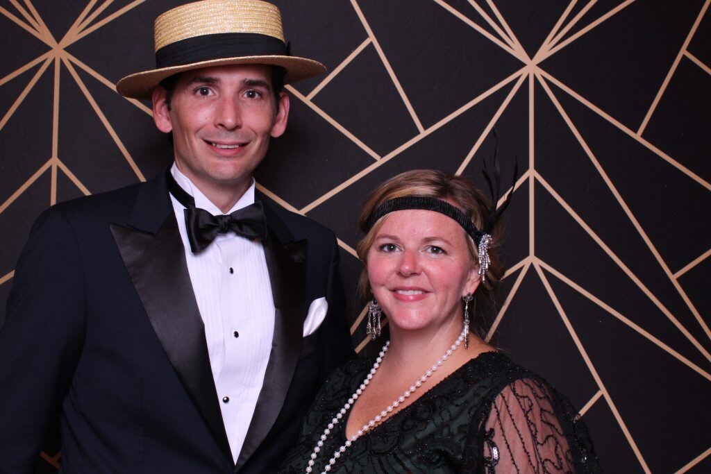 A couple in 1920s formal wear at the Gatsby Party