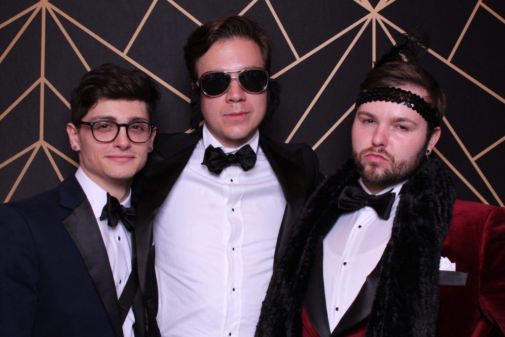 Three men in tuxedos