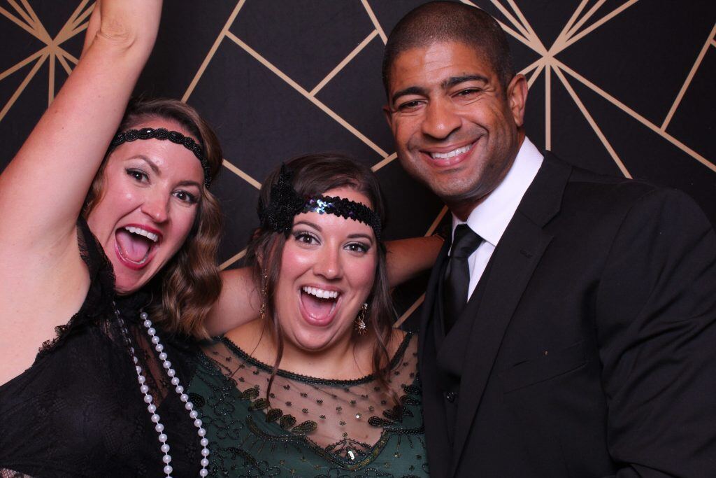 Guests cheering at the photo booth